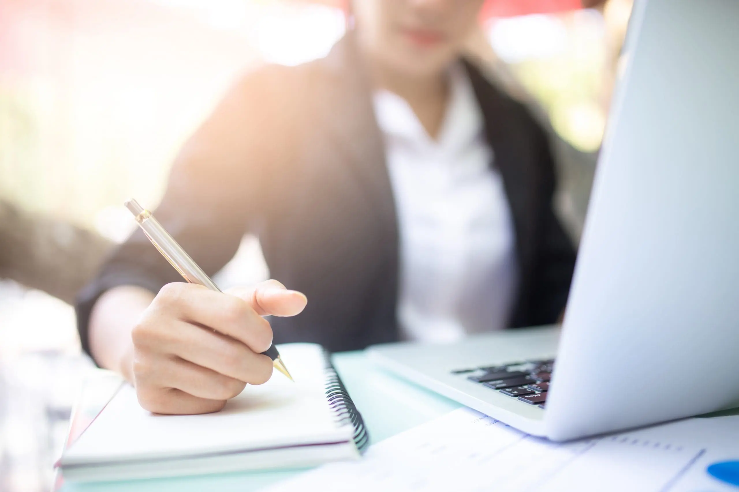 An aspiring financial advisor studies for her licensing exam.