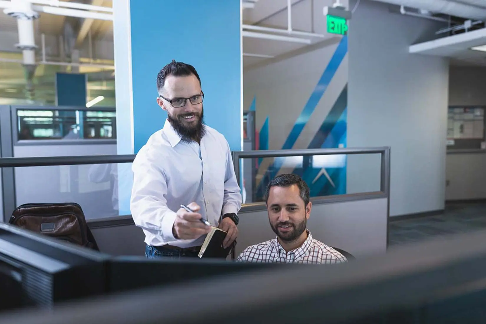 A mentor mentoring a mentee