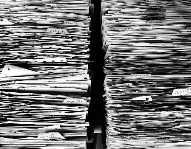 papers and folders in a row which advisors need to clean